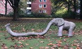 A sculpture of a small elephant that functions as a climbing frame in a park in Hamburg