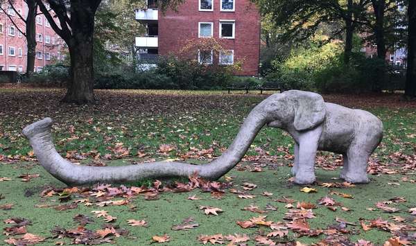 A sculpture of a small elephant that functions as a climbing frame in a park in Hamburg